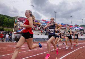 University sweeps 4x800 relay titles, Trinity’s McCurrie sets 2 records on 1st day of state track meet